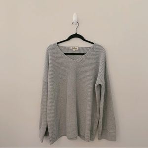 listicle oversized v-neck sweater